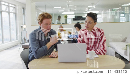 Image of financial data processing over diverse business people in office Image of financial data processing over diverse business people in office 124435250