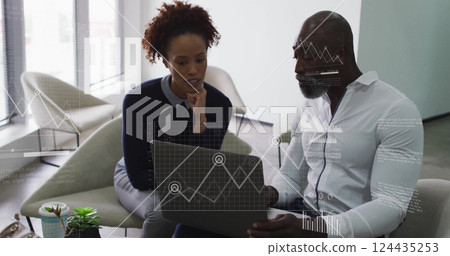 Image of financial data processing over diverse business people in office Image of financial data processing over diverse business people in office 124435253