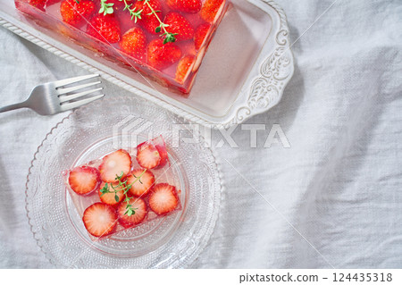 A transparent strawberry terrine with beautifully arranged strawberries A transparent strawberry terrine with beautifully arranged strawberries 124435318