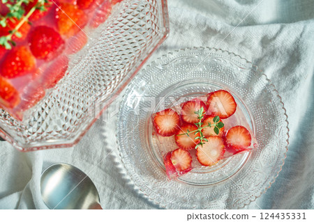 A transparent strawberry terrine with beautifully arranged strawberries A transparent strawberry terrine with beautifully arranged strawberries 124435331