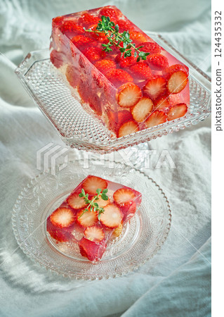 A transparent strawberry terrine with beautifully arranged strawberries A transparent strawberry terrine with beautifully arranged strawberries 124435332