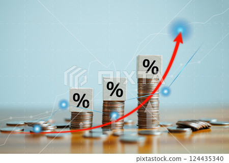 Interest rate and dividend concept, Percentage sign on wooden cubes with stack of coin. income, return, retirement, compensation fund, investment, dividend tax, stock market, loan business, arrow up 124435340
