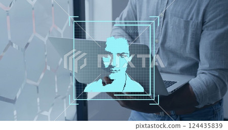 Image of data processing and people icons over biracial businessman using laptop in office Image of data processing and people icons over biracial businessman using laptop in office 124435839