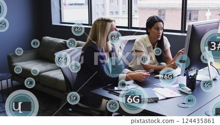 6G technology image over businesswomen working in modern office 6G technology image over businesswomen working in modern office 124435861