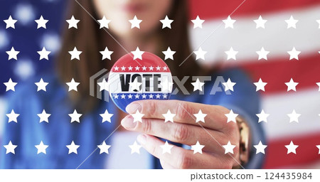 Image of stars over caucasian woman holding badge with vote text Image of stars over caucasian woman holding badge with vote text 124435984