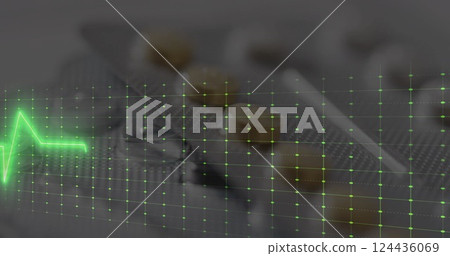 Image of cardiograph over pills 124436069