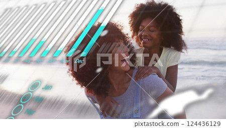 Image of data processing over african american mother and daughter on beach 124436129