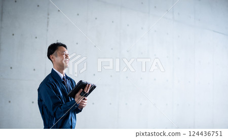 Men with tablets 124436751