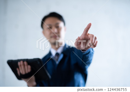 At the Engineer's Fingertips 124436755
