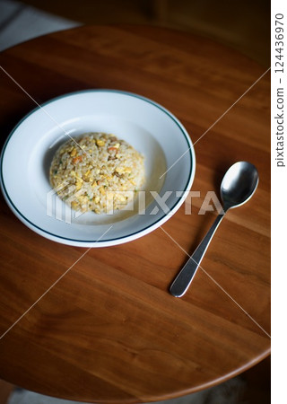 Simple fried rice served in a round shape on a plate 124436970