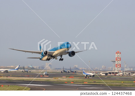 Vietnam Airlines plane taking off, passenger plane ascending 124437468