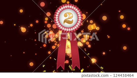 Image of rosette with number 2 and falling confetti and orange light spots on black background 124438464