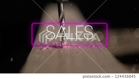 Image of sales text over wood drilling 124438845