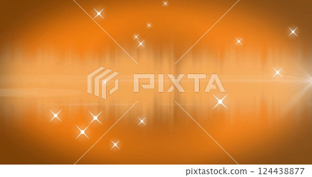 Image of light spots on orange background 124438877
