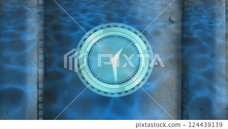 Image of clock moving fast over blue pattern background 124439139