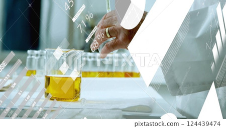 Image of data processing over caucasian male scientist in laboratory 124439474