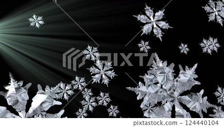Image of snowflakes over light trails on black background 124440104