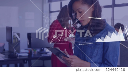 Image of financial data processing over biracial businesswoman using smartphone in office 124440418