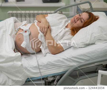 Happy Pregnant woman in the delivery room of the maternity hospital.  124441034