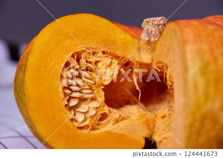A close-up of a ripe pumpkin. A close-up of a ripe pumpkin. 124441673