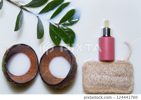 osmetic tube in milk. Natural cosmetics with rose extract or skin care spa salon or organic spa salon mockup 124441760