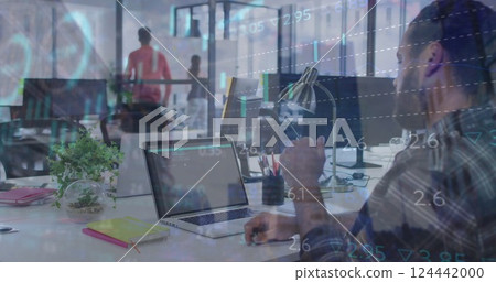 Image of financial data processing over caucasian businessman using computer in office Image of financial data processing over caucasian businessman using computer in office 124442000