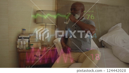 Image of cardiograph over senior african american man drinking water 124442028