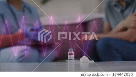 Image of cardiograph over diverse doctor and patient Image of cardiograph over diverse doctor and patient 124442030