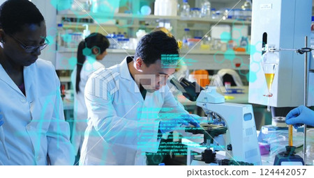 Image of scientific data processing over diverse scientists in laboratory 124442057