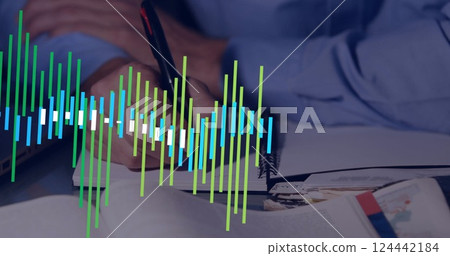 Image of financial data processing over caucasian businessman writing 124442184