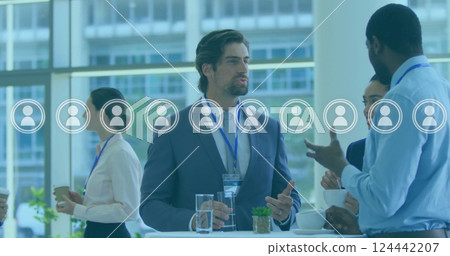 Image of people icons and data processing over diverse business people in office 124442207