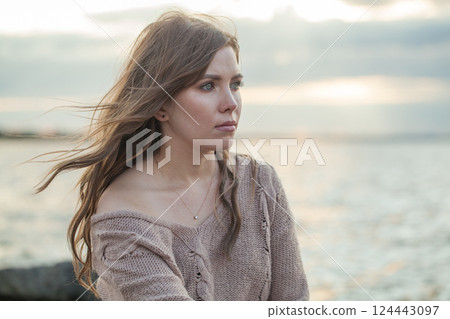 Glorious brunette woman 30 s years old resting outdoors 124443097