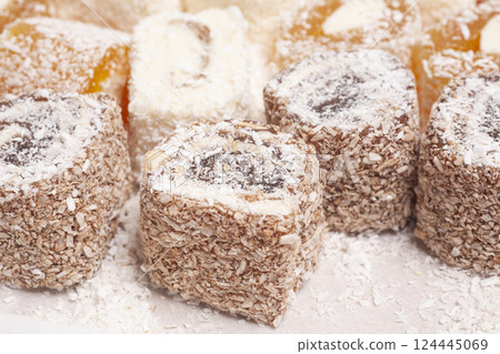 Traditional Turkish delight isolated on white background. 124445069