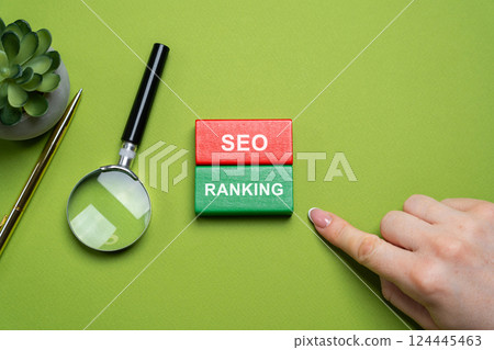 Blocks with words SEO ranking. Position a website or webpage holds in the search engine results pages (SERPs) for a specific keyword or phrase. Concept of internet and technology Blocks with words SEO ranking. Position a website or webpage holds in the search engine results pages (SERPs) for a specific keyword or phrase. Concept of internet and technology 124445463