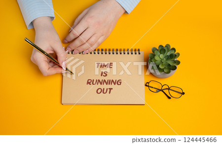Notes with the word Time is running out. Expression used to indicate that there is little time remaining to complete something or to make a decision. Lifestyle and planning life concept Notes with the word Time is running out. Expression used to indicate that there is little time remaining to complete something or to make a decision. Lifestyle and planning life concept 124445466