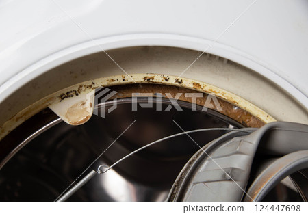 Old rubber hatch seal with washing machine defect, industry 124447698