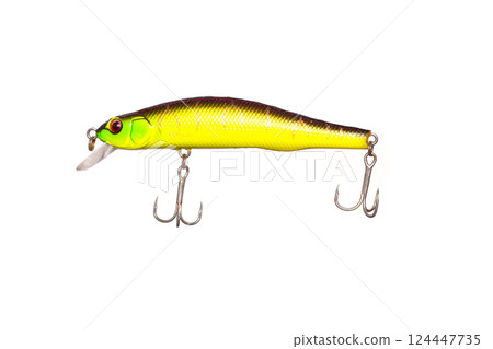 yellow fishing lure on white background, isolate, close-up 124447735