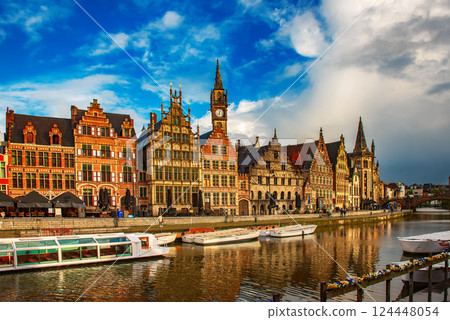 Ghent city historical center, tourists boats and colorful buildings on Leie river bank, Belgium 124448054