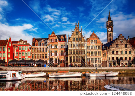 Ghent city historical center, tourists boats and colorful buildings on Leie river bank, Belgium Ghent city historical center, tourists boats and colorful buildings on Leie river bank, Belgium 124448098