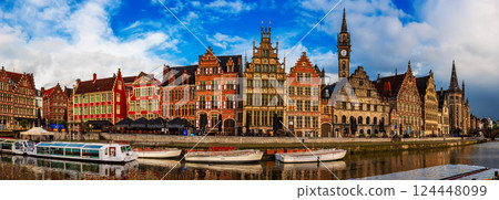 Ghent city historical center, tourists boats and colorful buildings on Leie river bank, Belgium Ghent city historical center, tourists boats and colorful buildings on Leie river bank, Belgium 124448099
