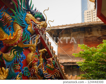 Woman Exploring Colorful Streets Near Buddhist Temples in Bangkok Woman Exploring Colorful Streets Near Buddhist Temples in Bangkok 124448300