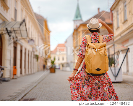 Woman Walking Through the Historic Center of Varazdin 124448422