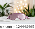 Silk eye mask for sleep, bed, plants and light bokeh 124448495