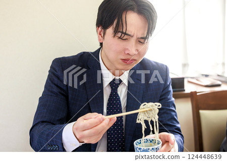 Salaryman eating Zaru Soba 124448639