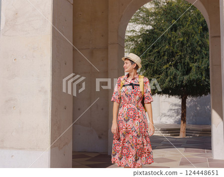 Young female tourist exploring iconic landmarks of the United Arab Emirates. 124448651