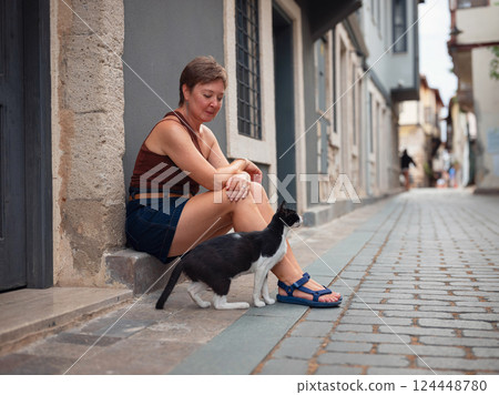 Woman walking narrow streets of old town Antalya Turkey 124448780