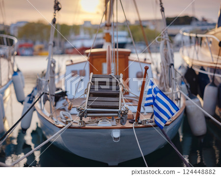 View of Greek flag waving in air serene Mediterranean vibe. View of Greek flag waving in air serene Mediterranean vibe. 124448882