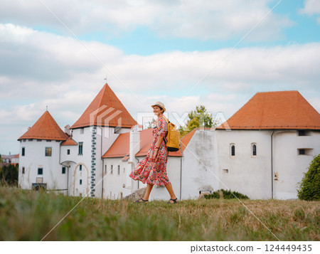 Woman Walking Through the Historic Center of Varazdin 124449435