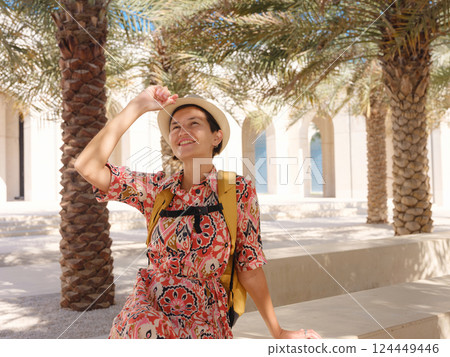 Young female tourist exploring iconic landmarks of the United Arab Emirates. 124449446