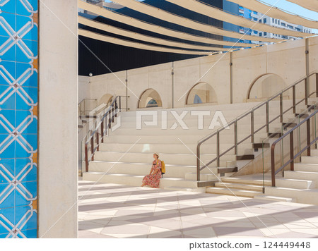 Young female tourist exploring iconic landmarks of the United Arab Emirates. 124449448
